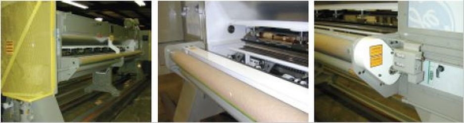 Tufting machine with servo cloth feed